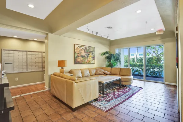 a living room with a couch and a table