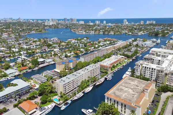 an aerial view of city and lake