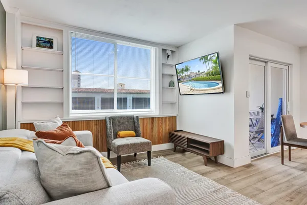 a living room with furniture and a window