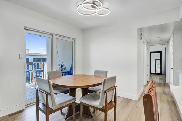 a view of a dining room with furniture