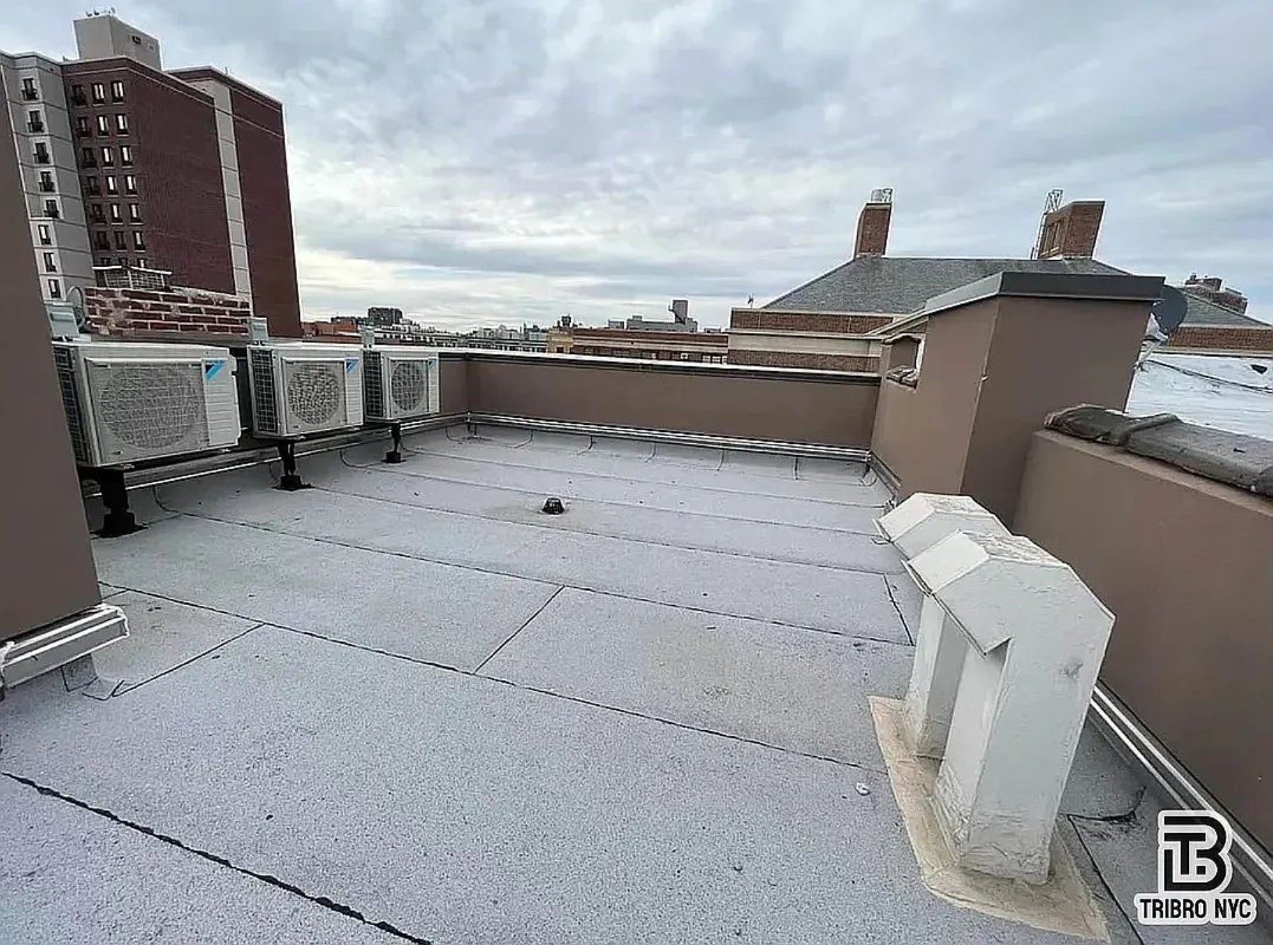 9 Cook Street, Unit 2F Brooklyn, NY 11206 - Photo 8 of 9 a view of roof deck with couch