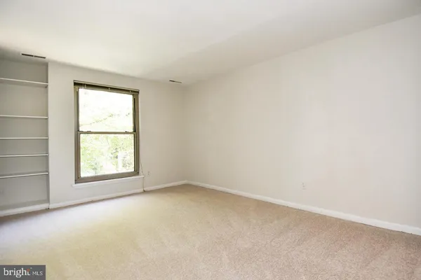 an empty room with a window