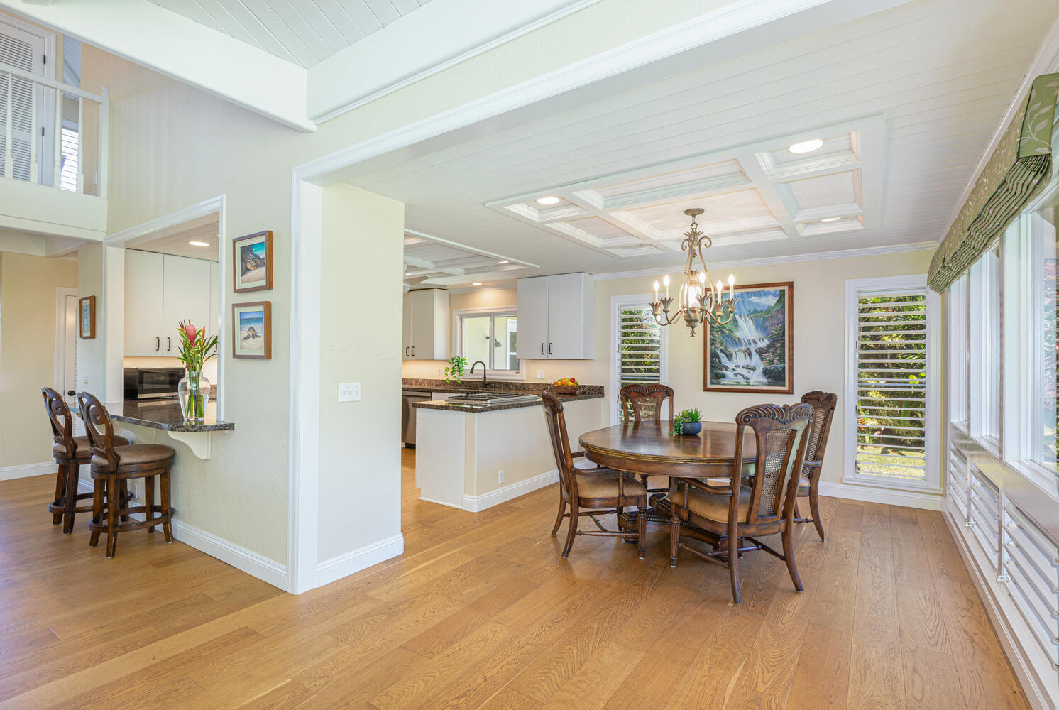 4165 Liholiho Road Princeville, HI 96722 - Photo 11 of 28 a view of a dining room with furniture and wooden floor