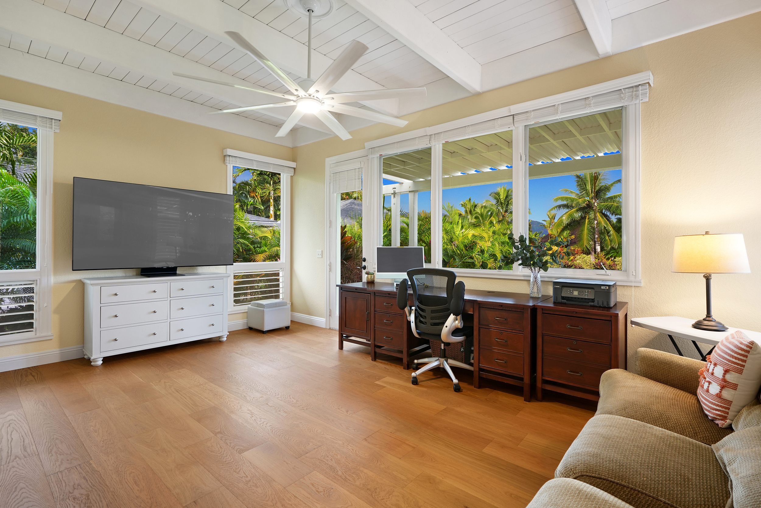 4165 Liholiho Road Princeville, HI 96722 - Photo 12 of 29 a living room with furniture and a flat screen tv