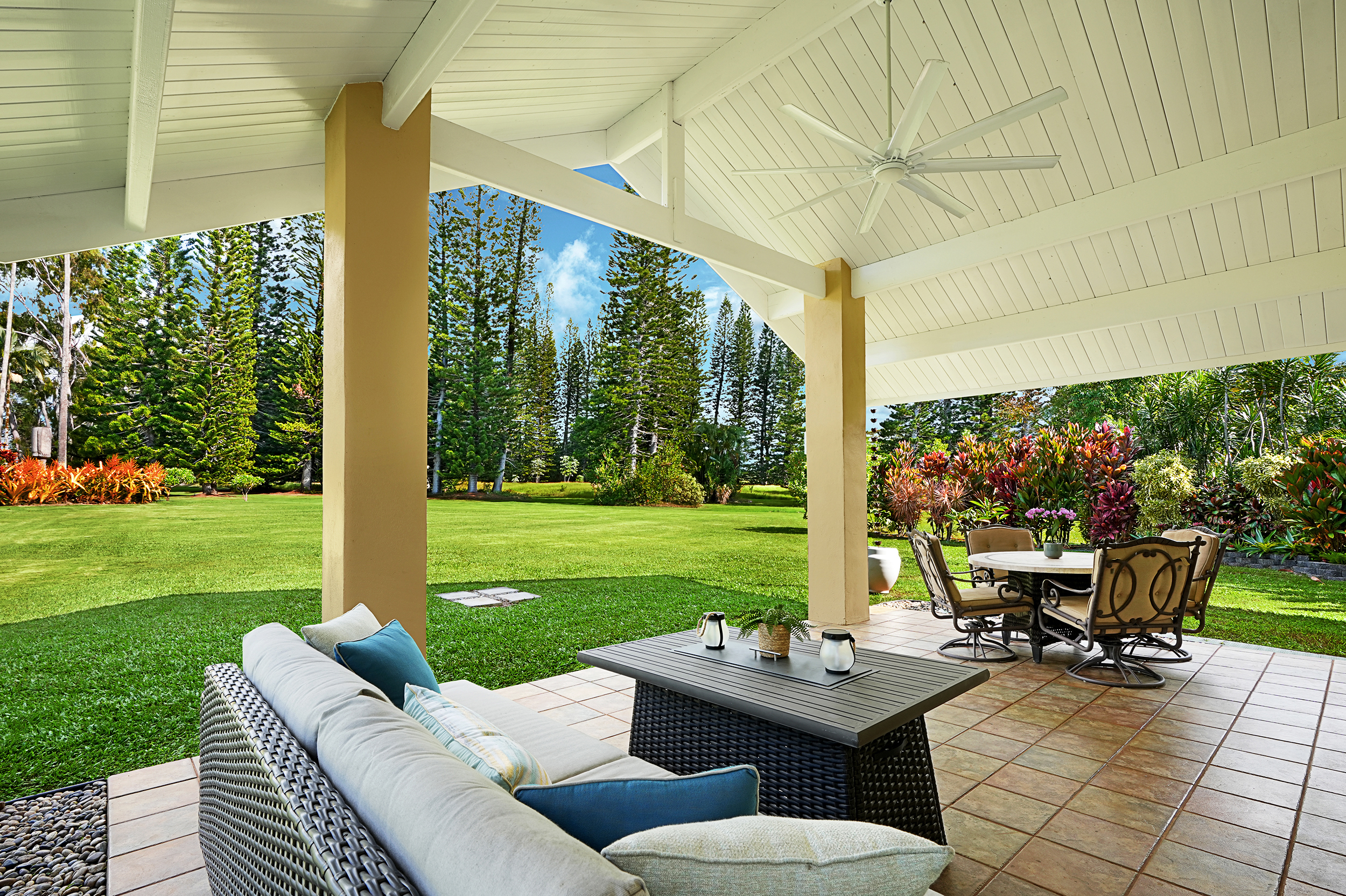 4165 Liholiho Road Princeville, HI 96722 - Photo 20 of 29 a view of a patio with table and chairs potted plants with garden view