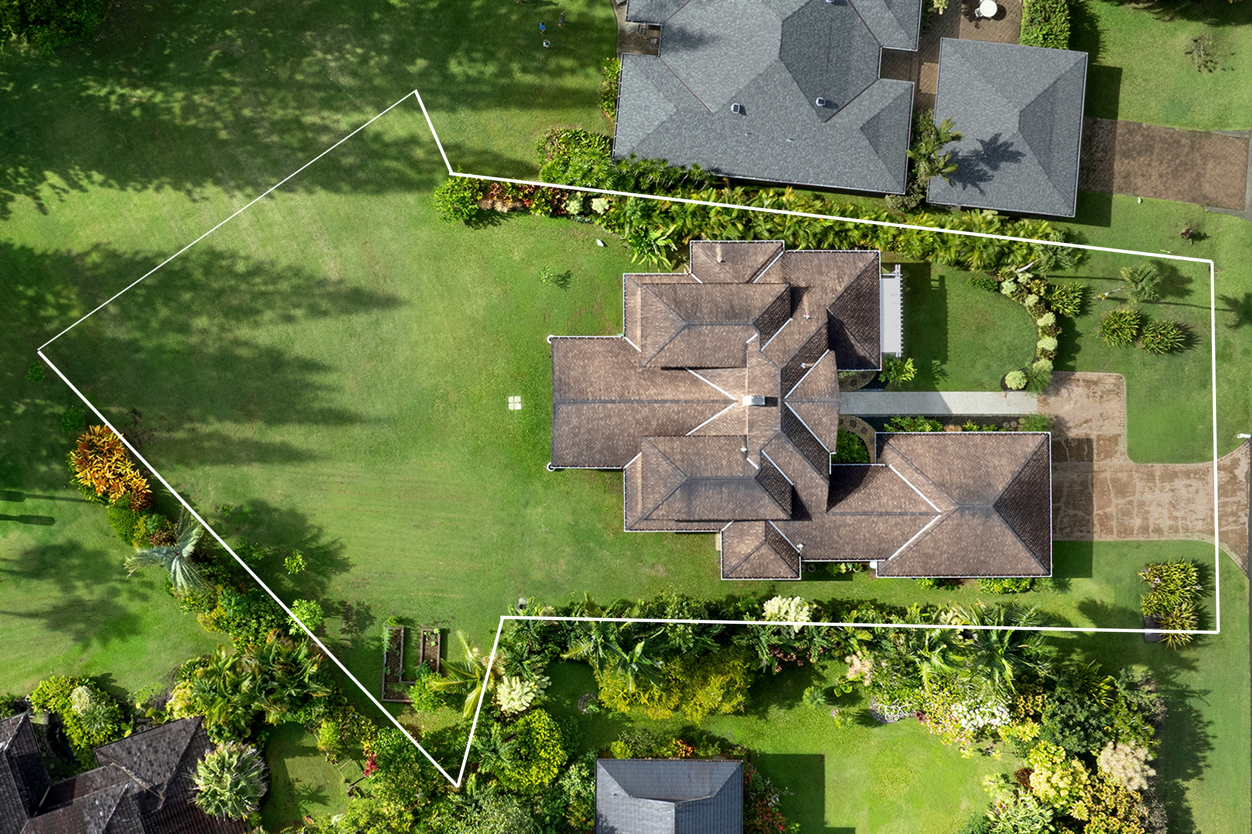 4165 Liholiho Road Princeville, HI 96722 - Photo 23 of 29 an aerial view of residential houses with outdoor space and street view