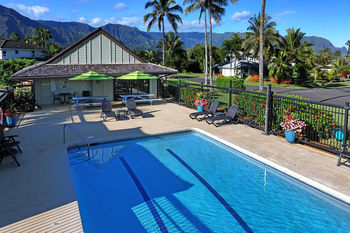 4165 Liholiho Road Princeville, HI 96722 - Photo 28 of 29 a view of a house with backyard and sitting area