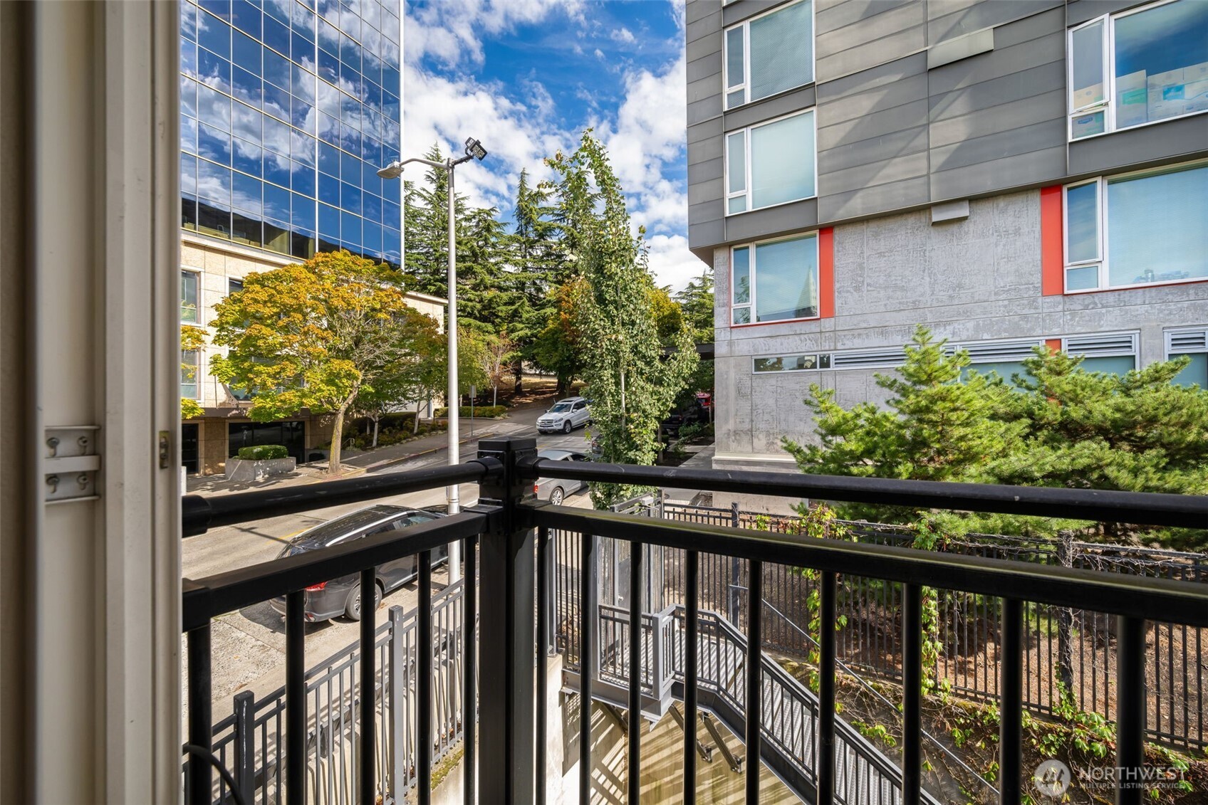 108 5th Avenue South, Unit 720 Seattle, WA 98104 - Photo 16 of 23 a view of a street from a balcony