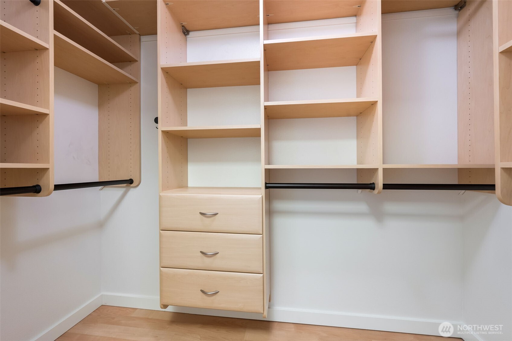 108 5th Avenue South, Unit 720 Seattle, WA 98104 - Photo 17 of 23 a view of walk in closet with empty racks