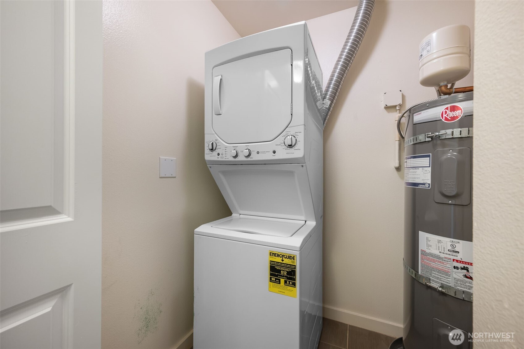 108 5th Avenue South, Unit 720 Seattle, WA 98104 - Photo 19 of 23 a utility room with dryer and washer