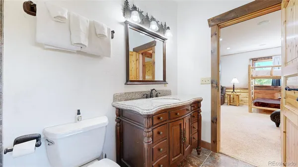 a bed room with a bed and a window