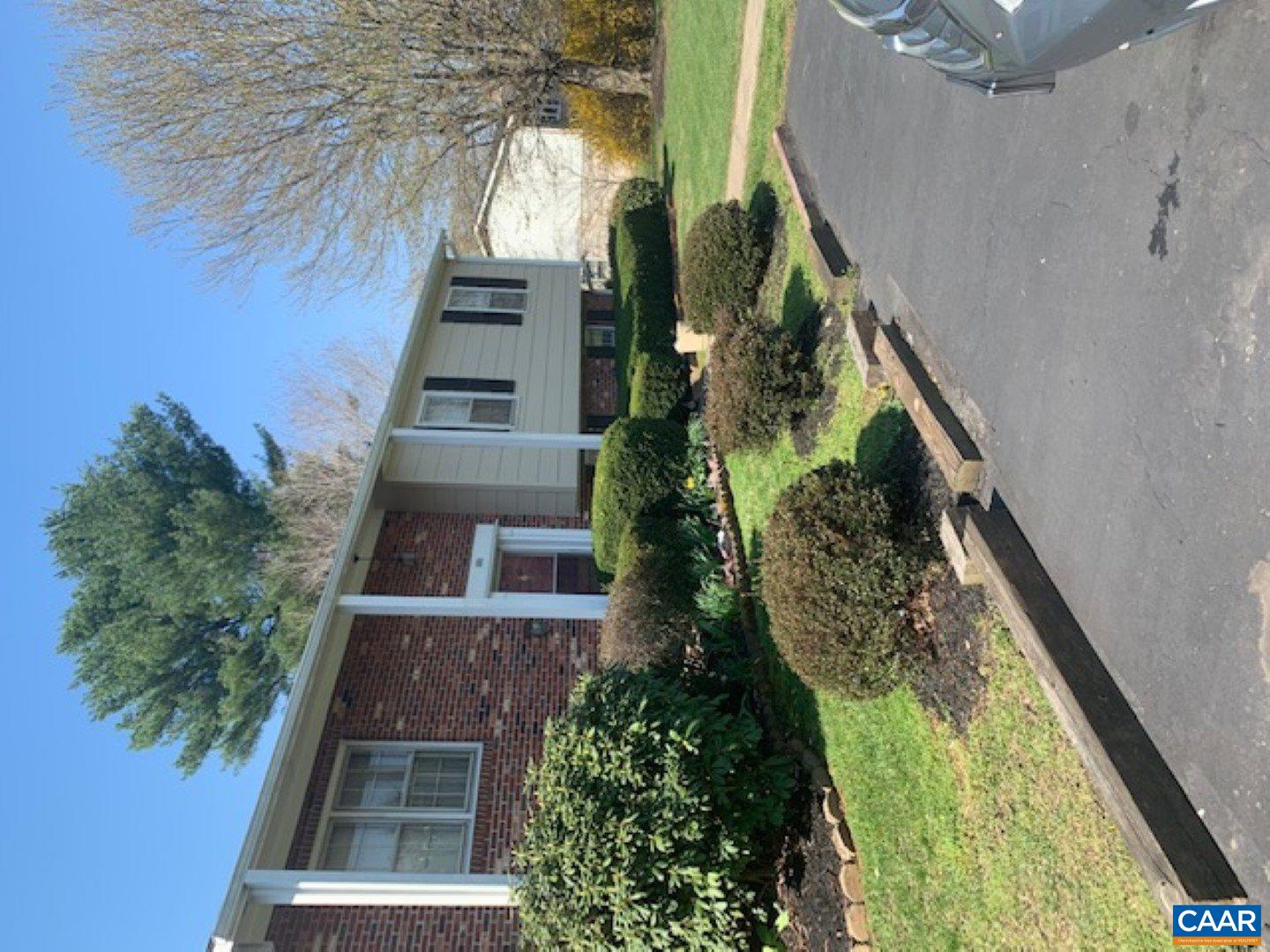 101 Cedar Grove Road Ruckersville, VA 22968 - Photo 2 of 6 a front view of a house with a yard and garage