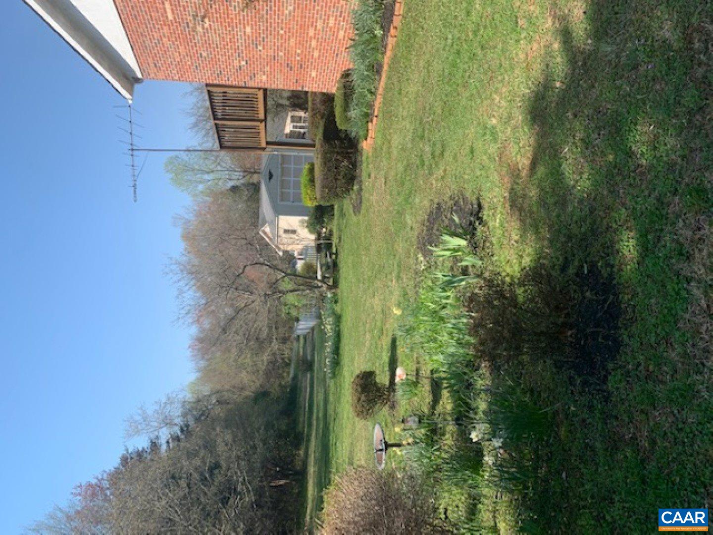 101 Cedar Grove Road Ruckersville, VA 22968 - Photo 3 of 6 a view of a house with a yard