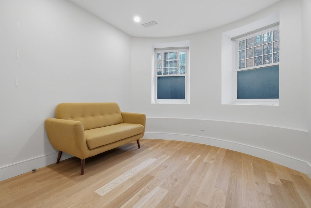 38 Englewood Avenue, Unit 2 Boston, MA 02135 - Photo 14 of 23 a living room with furniture and a window