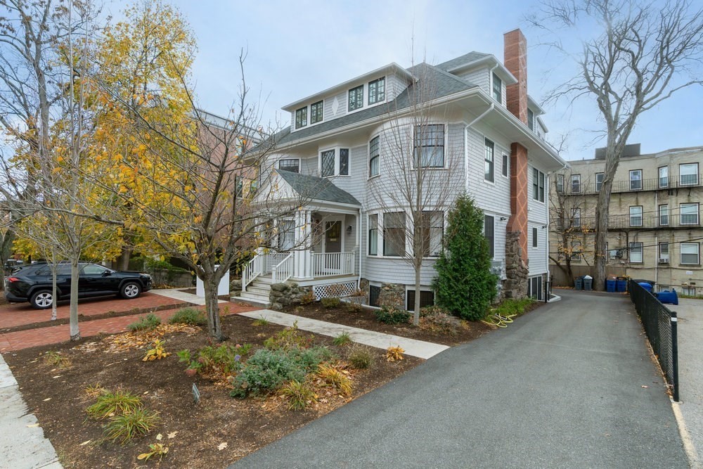 38 Englewood Avenue, Unit 2 Boston, MA 02135 - Photo 22 of 23 a front view of a house with a yard
