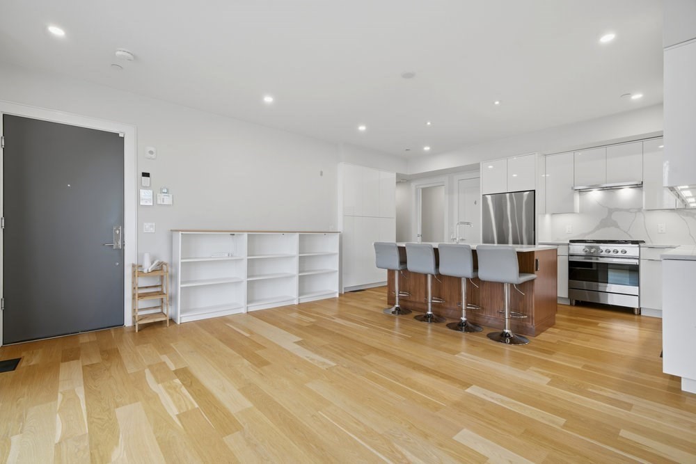 38 Englewood Avenue, Unit 2 Boston, MA 02135 - Photo 3 of 23 a view of a kitchen with furniture and a kitchen