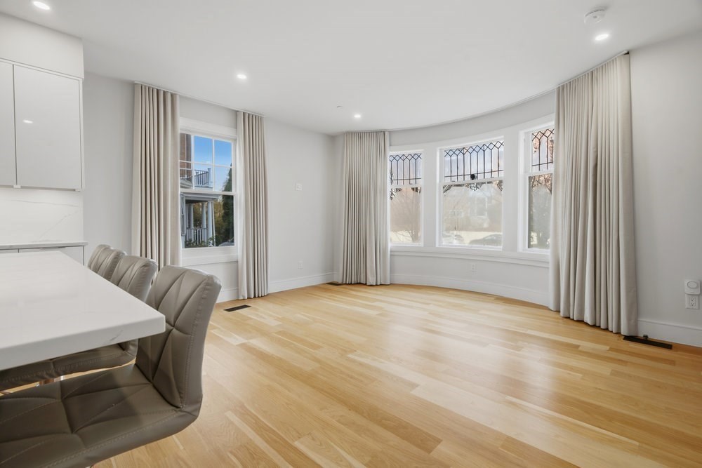 38 Englewood Avenue, Unit 2 Boston, MA 02135 - Photo 7 of 23 a view of livingroom with furniture and windows