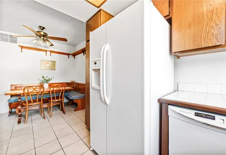 a view of a livingroom with furniture and a window
