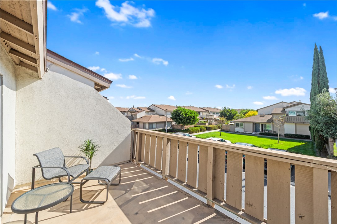 5132 West 1st Street, Unit B Santa Ana, CA 92703 - Photo 18 of 35 a view of a porch with furniture and a yard