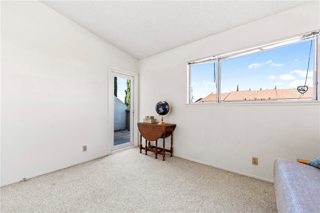 5132 West 1st Street, Unit B Santa Ana, CA 92703 - Photo 24 of 35 a workspace with furniture and window