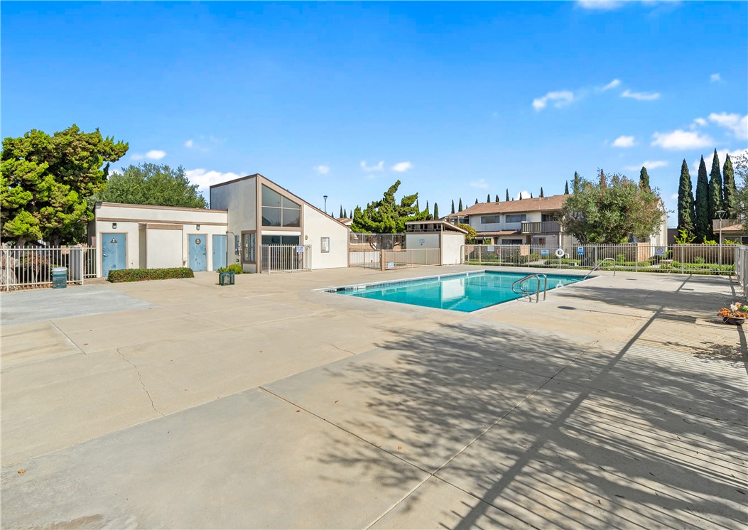 5132 West 1st Street, Unit B Santa Ana, CA 92703 - Photo 33 of 35 a house with yard and street view