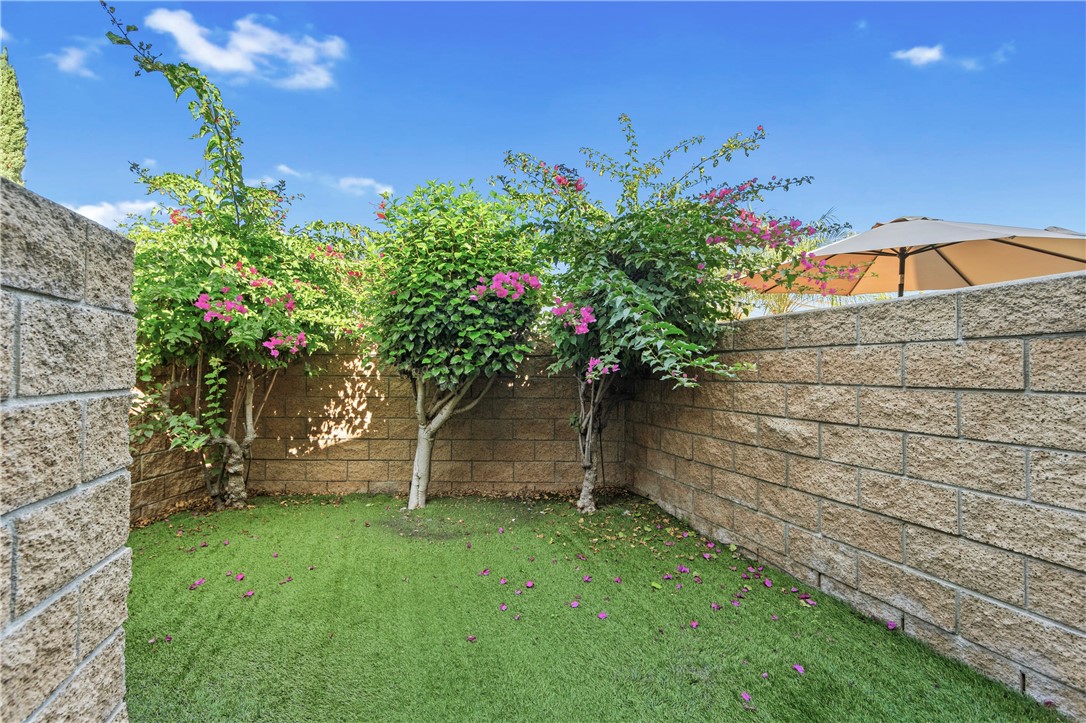 5132 West 1st Street, Unit B Santa Ana, CA 92703 - Photo 6 of 35 a view of a backyard with plants