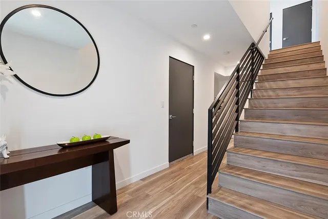 a view of entryway with wooden floor