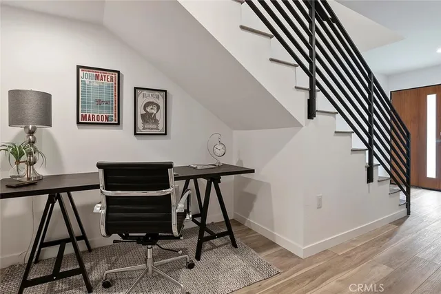 a view of entryway and workspace