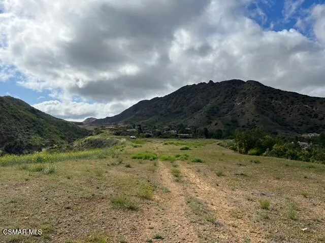 a view of mountains and valleys