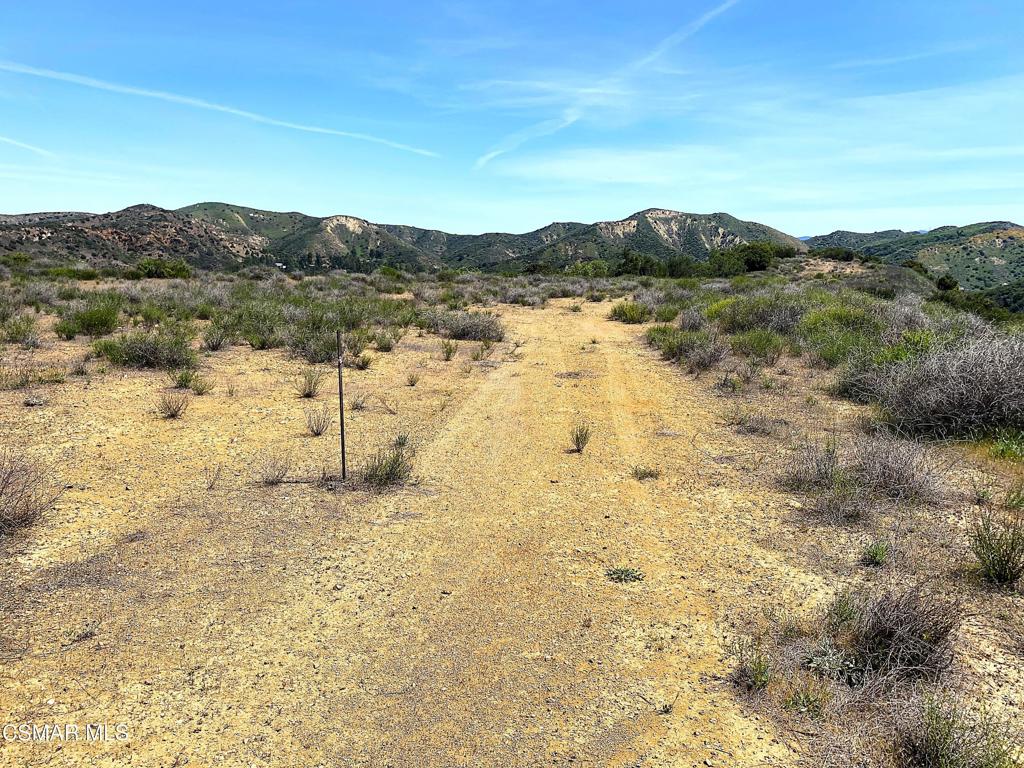 29266 Wagon Road Agoura Hills, CA 91301 - Photo 2 of 18 a view of lake view and mountain view