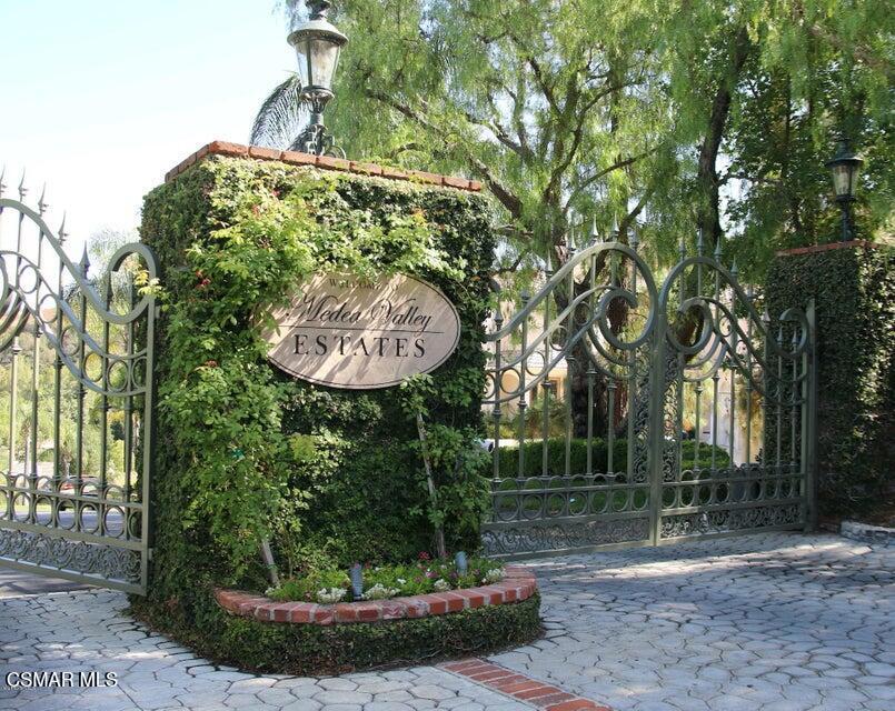 29266 Wagon Road Agoura Hills, CA 91301 - Photo 4 of 18 a backyard of a house with lots of green space