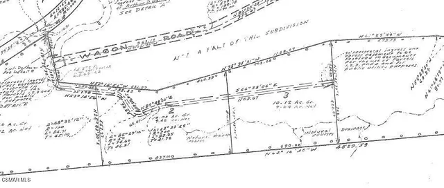 a picture of a glass window with a white wall