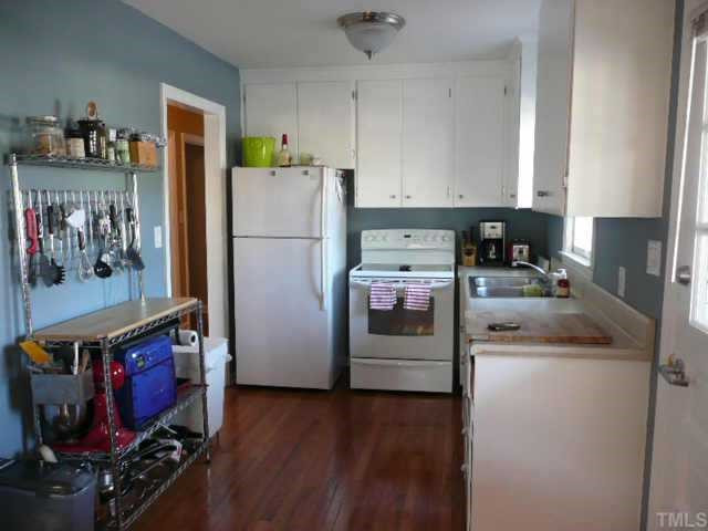 600 Edmund Street Raleigh, NC 27604 - Photo 10 of 12 More options - Add cabinets, your mothers pie safe or open shelves on the left wall of the bright kitchen. Other