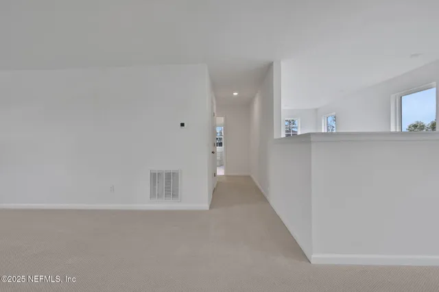 a view of front door of house with yard