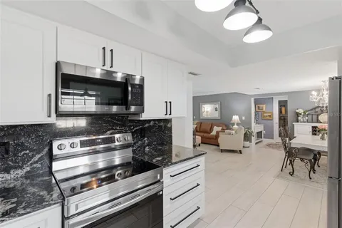 a view of a kitchen sink and window