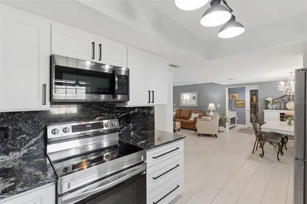 a view of a kitchen sink and window