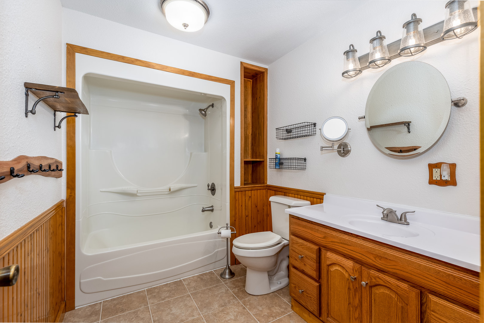 1522 East State Route 71 Ottawa, IL 61350 - Photo 13 of 35 a bathroom with a granite countertop sink mirror toilet and bathtub