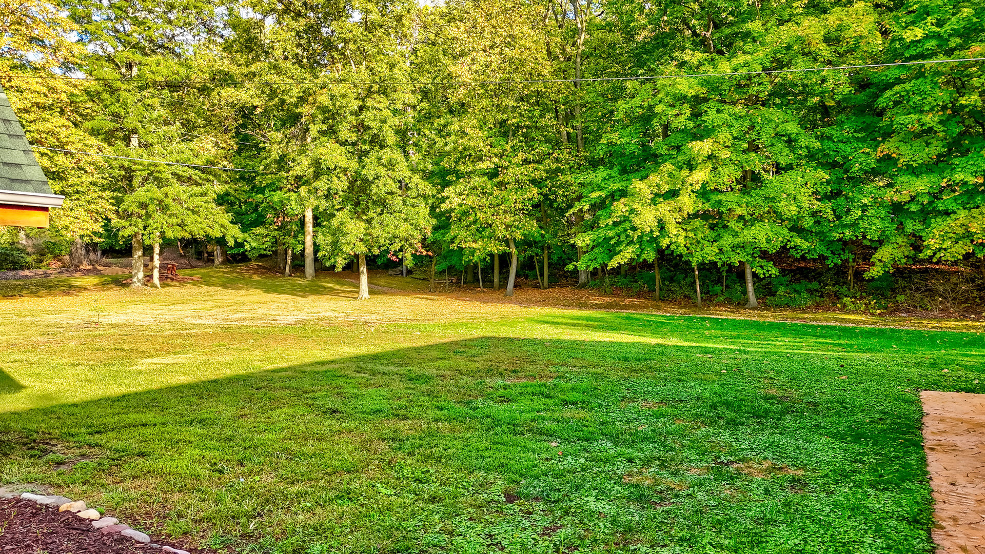1522 East State Route 71 Ottawa, IL 61350 - Photo 27 of 35 a view of swimming pool with a big yard and large trees