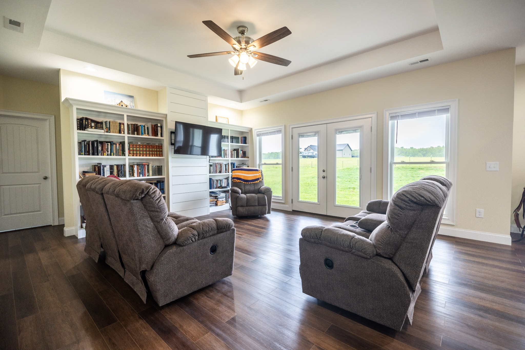 155 Colonial Road Hohenwald, TN 38462 - Photo 12 of 36 a living room with furniture and a large window