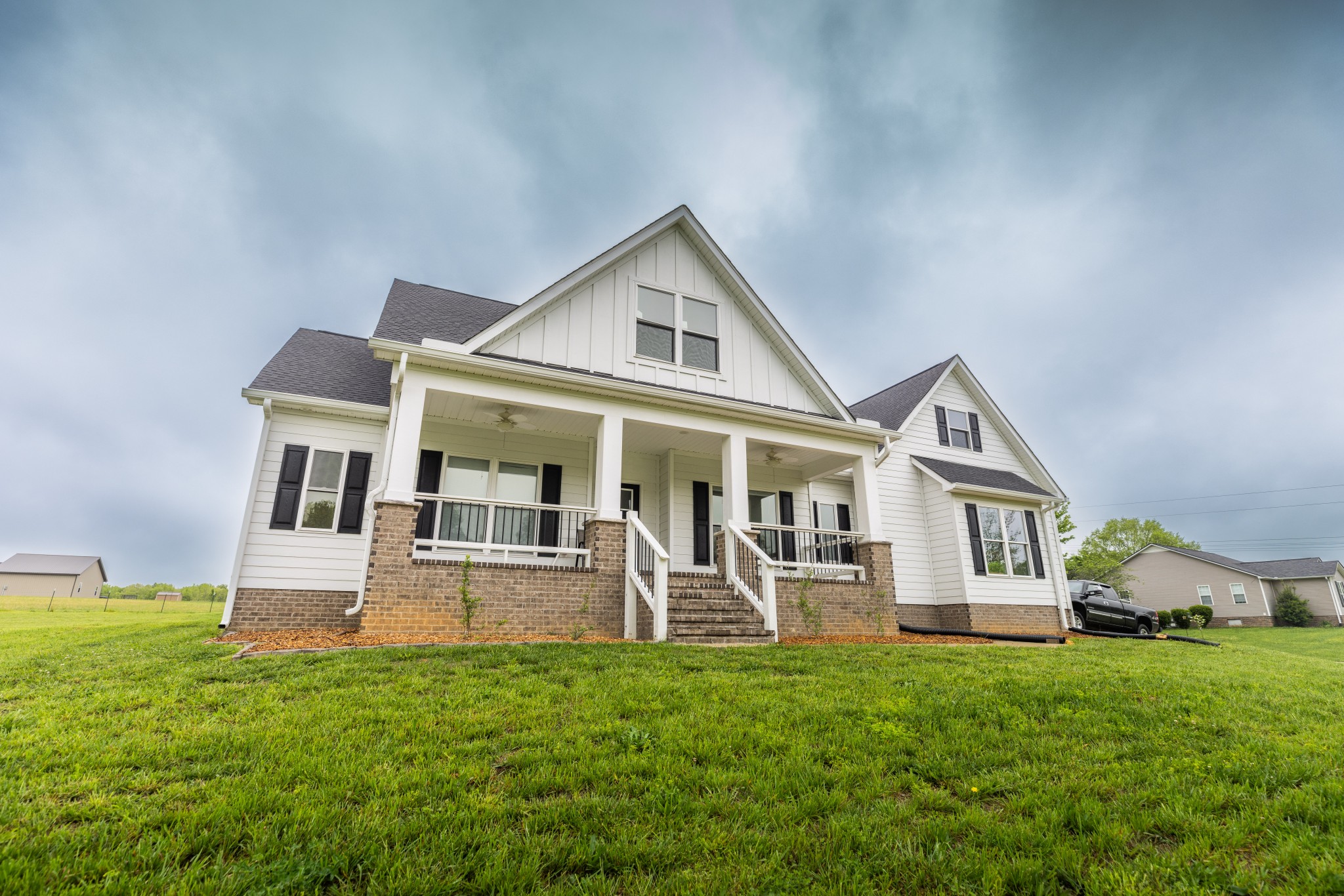155 Colonial Road Hohenwald, TN 38462 - Photo 31 of 36 front view of house with a yard