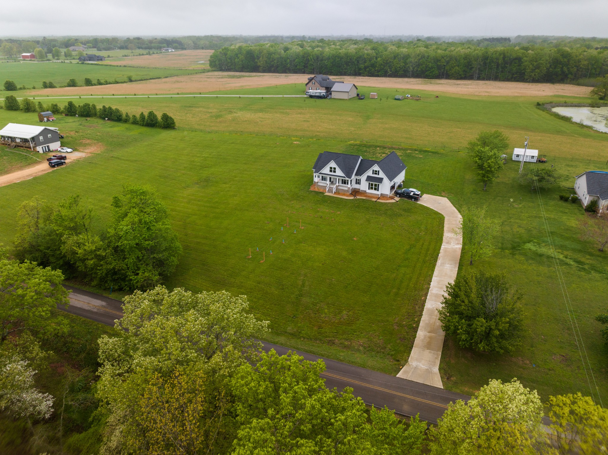 155 Colonial Road Hohenwald, TN 38462 - Photo 34 of 36 a view of a lake with a mountain