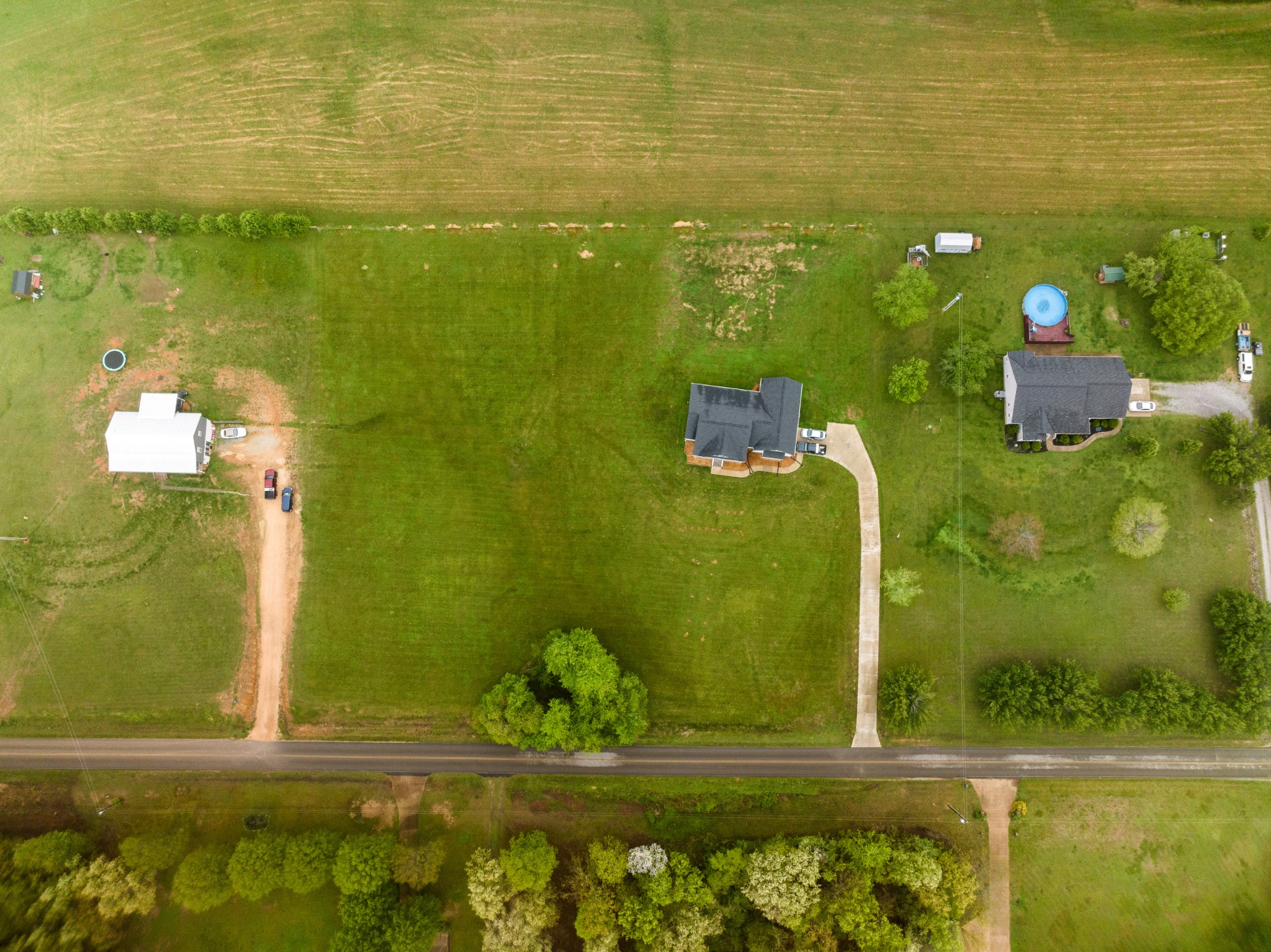 155 Colonial Road Hohenwald, TN 38462 - Photo 35 of 36 a view of swimming pool from a bathroom