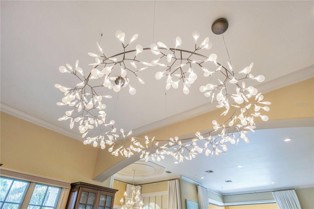 11103 Bridge House Road Windermere, FL 34786 - Photo 19 of 90 a view of a chandelier in a room