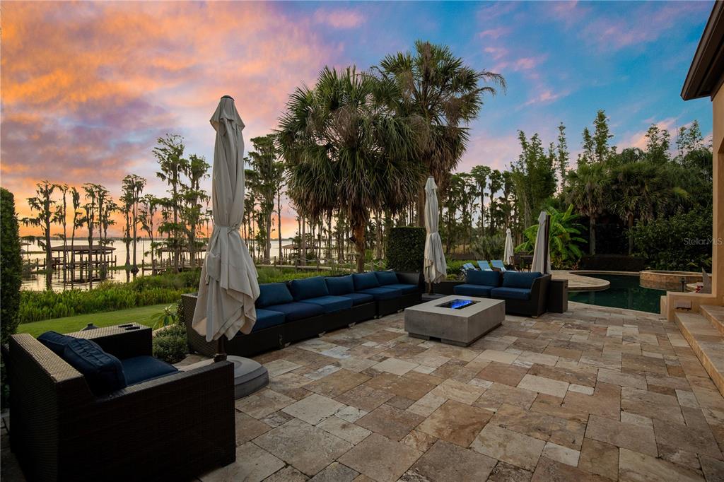 11103 Bridge House Road Windermere, FL 34786 - Photo 4 of 90 a street view with sitting space and garden view