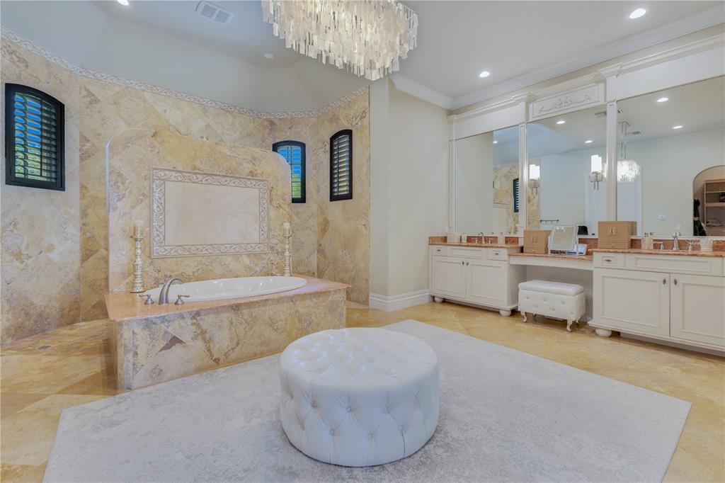 11103 Bridge House Road Windermere, FL 34786 - Photo 41 of 90 a large spacious bathroom with a tub sink and mirror