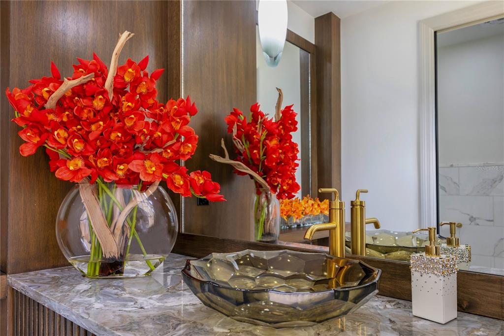 11103 Bridge House Road Windermere, FL 34786 - Photo 70 of 90 a vase of flowers sitting on a table