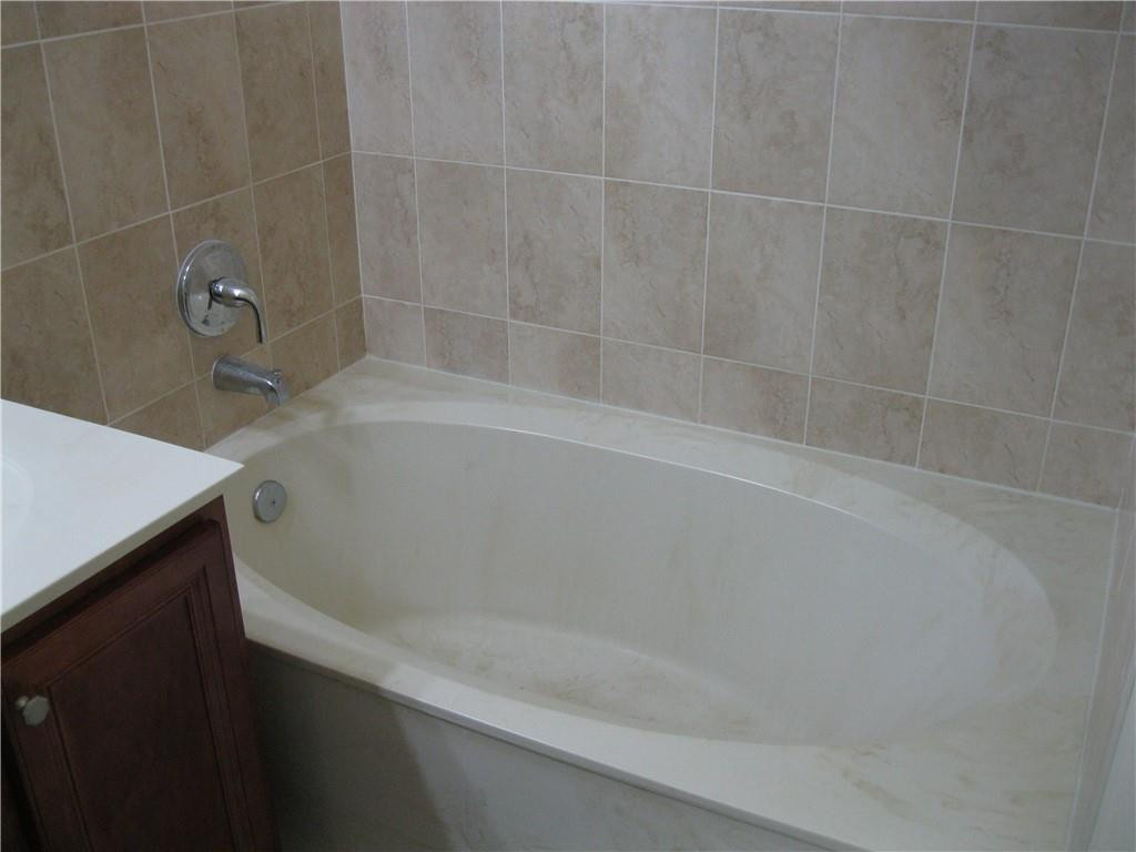 20767 Northeast 10th Path, Unit 20767 Miami, FL 33179 - Photo 16 of 26 a close up of a bathtub