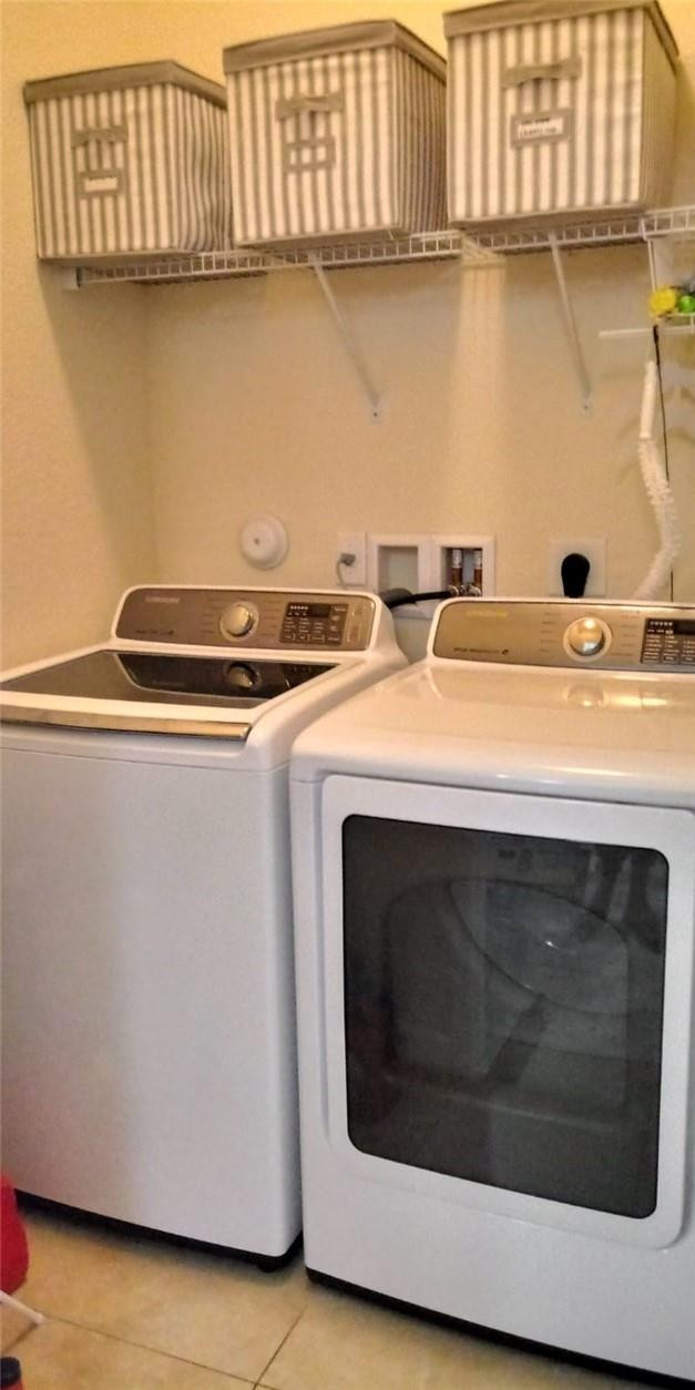 20767 Northeast 10th Path, Unit 20767 Miami, FL 33179 - Photo 4 of 26 a utility room with dryer and washer