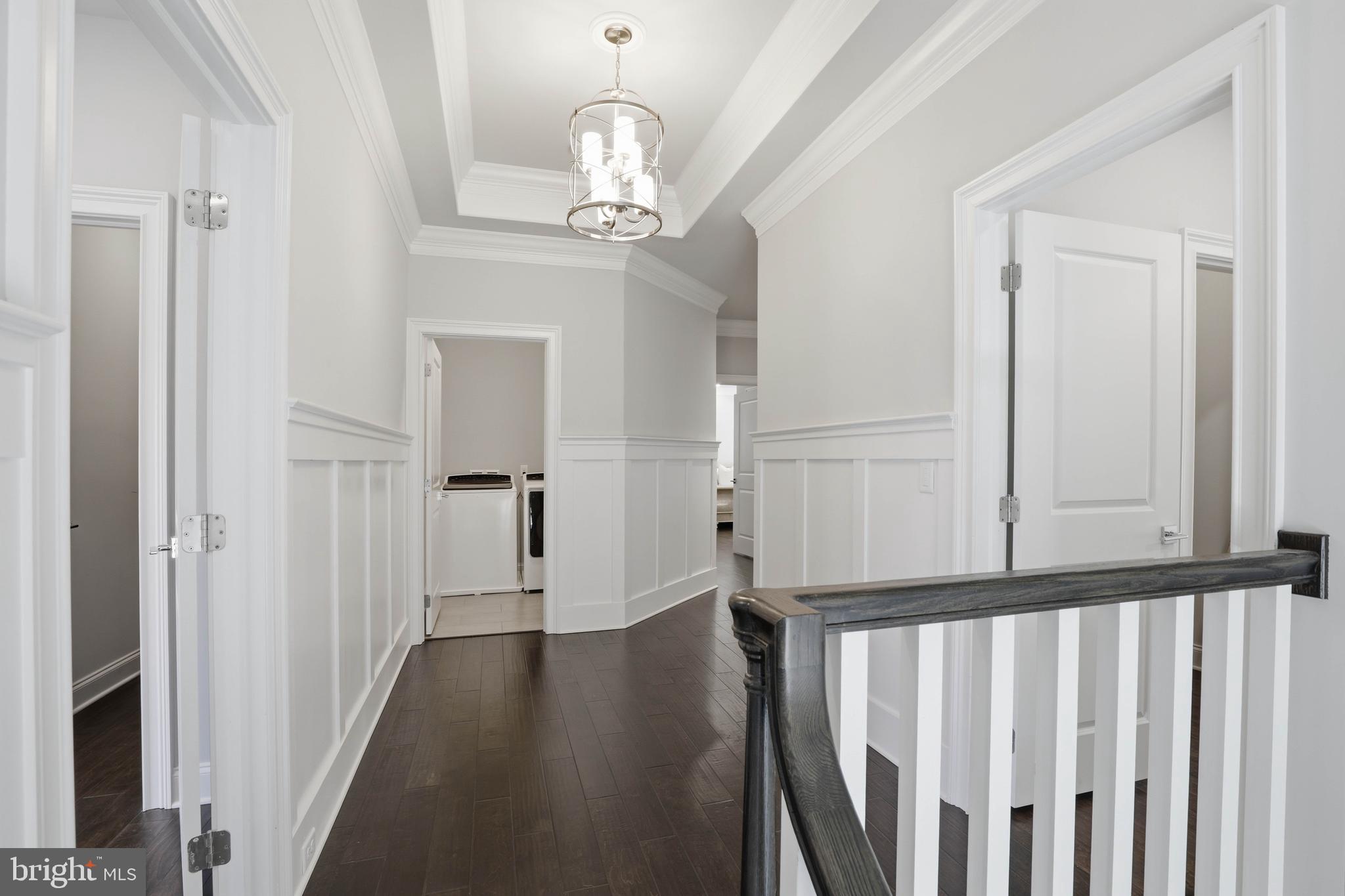 360 Addison Place Lancaster, PA 17601 - Photo 32 of 78 a view of a hallway with wooden floor and staircase