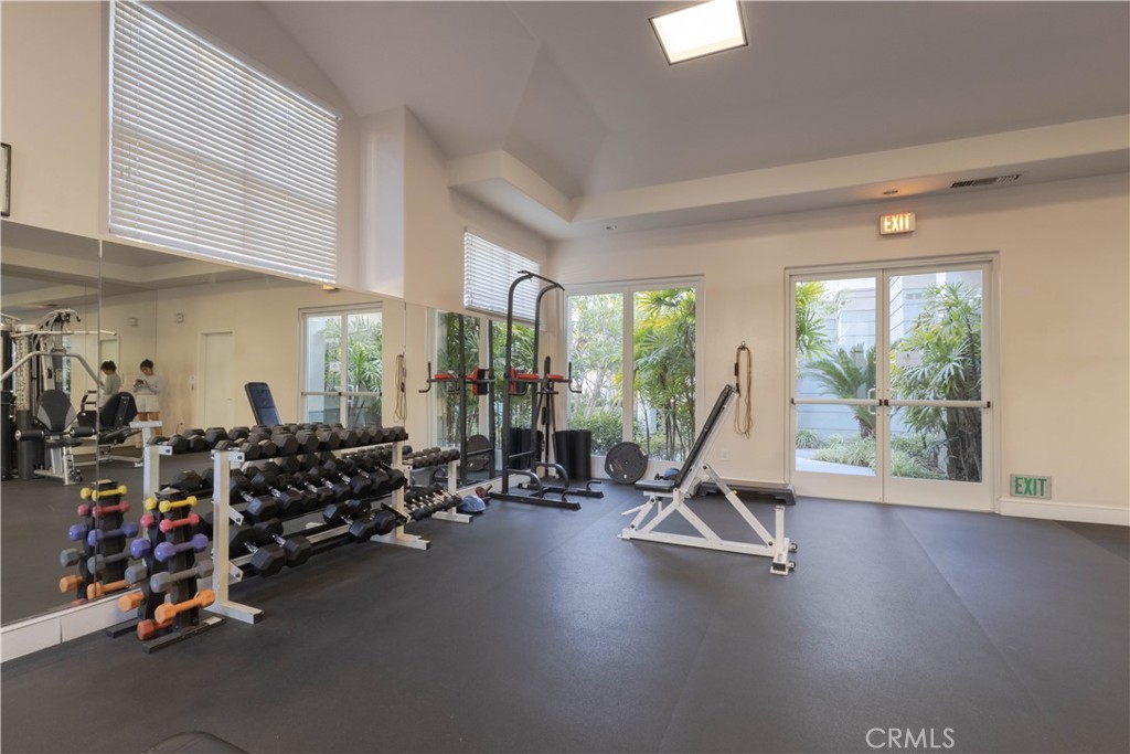 2233 Martin, Unit 108 Irvine, CA 92612 - Photo 20 of 31 a view of a room with gym equipment